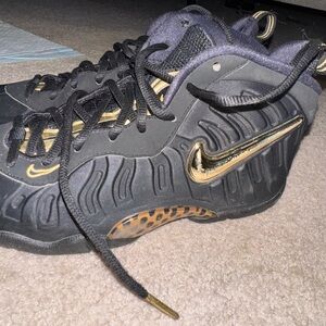 Nike Black and Gold Sneakers